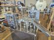 Envasadora dosadora rotativa semi-autom�tica para potes com tampa em alum�nio NTI